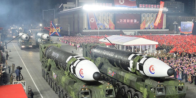 This photo provided by the North Korean government, shows what it says is Hwasong-17 intercontinental ballistic missiles during a military parade in Pyongyang, North Korea, Wednesday, Feb. 8, 2023. 