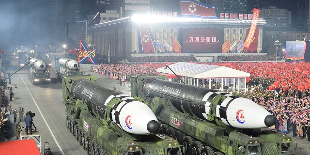 This photo provided by the North Korean government, shows what it says is Hwasong-17 intercontinental ballistic missiles during a military parade in Pyongyang, North Korea, Wednesday, Feb. 8, 2023. 