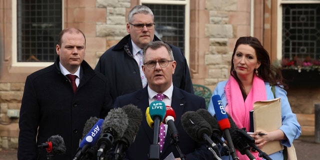 Northern Ireland political leaders, from left, Gordon Lyons, Gavin Robinson, Sir Jeffrey Donaldson and Emma Little-Pengelly speak in Belfast outside where Prime Minister Rishi Sunak held talks over the Northern Ireland Protocol on Feb. 17, 2023.