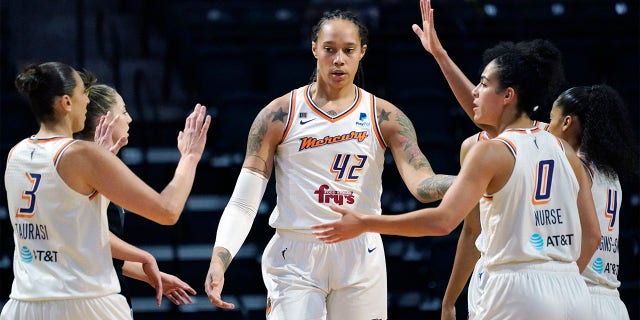 Phoenix Mercury's Brittney Griner (42) is congratulated on a play against the Seattle Storm in the first half of the second round of the WNBA basketball playoffs on Sunday, September 26, 2021 in Everett, Washington.  Griner, who was a free agent, re-signed with Mercury on a one-year deal, according to a person familiar with the deal.  The person spoke to The Associated Press on condition of anonymity on Saturday, February 18, 2023, because no announcement has been made. 