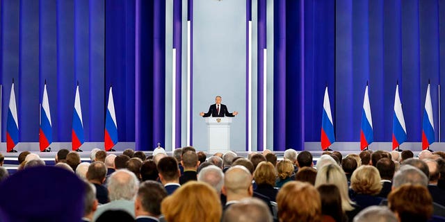 Russian President Vladimir Putin gestures during his annual speech in Moscow on Tuesday.