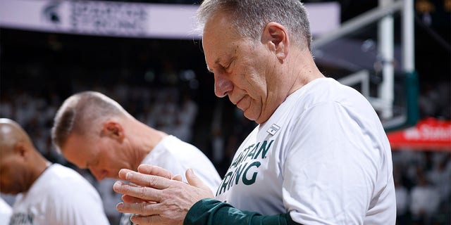 Michigan State coach Tom Izzo observes a moment of silence before the team's NCAA college basketball game against Indiana, Tuesday, February 21, 2023, in East Lansing, Michigan.  Hundreds of people packed a Detroit church Tuesday for the funeral of a 19-year-old Detroit-area woman, an aspiring doctor who was one of three students shot to death last week in the state of Michigan.
