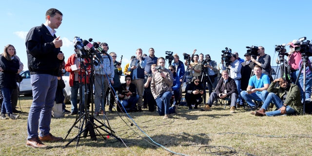 Secretary of Transportation Pete Buttigieg speaks during a news conference Thursday, Feb. 23, 2023, near the site of the Feb. 3 Norfolk Southern train derailment in East Palestine, Ohio. (AP Photo/Matt Freed)