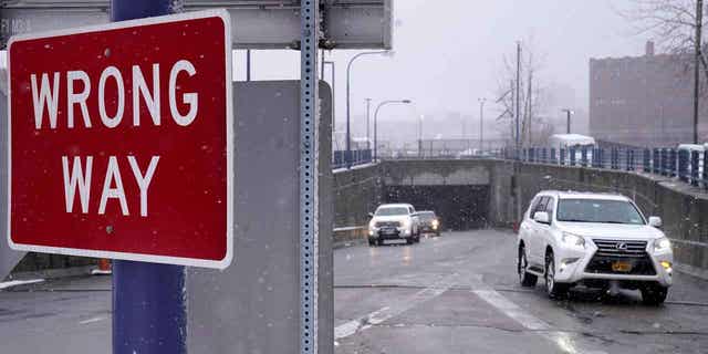 A "Wrong "Way" sign warns drivers from entering westbound on an eastbound exit ramp in Boston, Massachusetts, on Feb. 23, 2023. States across the U.S. are looking into ways to curb the frequency of wrong-way crashes.