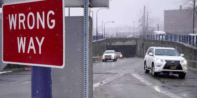 A "Wrong "Way" sign warns drivers from entering westbound on an eastbound exit ramp in Boston, Massachusetts, on Feb. 23, 2023. States across the U.S. are looking into ways to curb the frequency of wrong-way crashes.