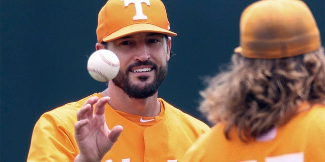 Tennessee head coach Tony Vitello, left, talks with pitcher Kirby Connell before an NCAA college baseball super regional game against Notre Dame on June 11, 2022, in Knoxville, Tennessee.  Tennessee has suspended Vitello, Friday, February 24, 2023, for the Volunteers' Weekend Series with Dayton as university officials, Vitello and the NCAA handle a violation on the program. 