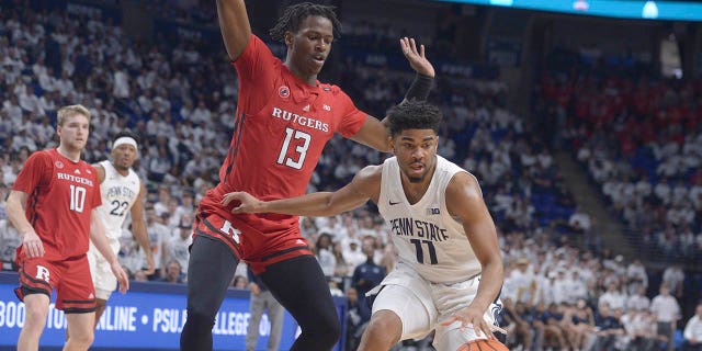 Rutgers' Antwon Woolfolk (13) defends against Penn State's Camren Winter (11) during the first half of an NCAA college basketball game, Sunday, Feb. 12.  December 26, 2023 at State College, Pennsylvania. 