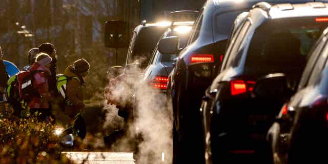 Cars springiness disconnected exhaust fumes successful Frankfurt, Germany, connected Feb. 27, 2023. Bigger cars airs a increasing problem for nan situation because they nutrient much greenhouse state emissions.