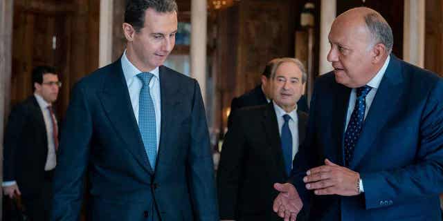 Syrian President Bashar Assad, left, meets with Egyptian Foreign Minister Sameh Shoukry in Damascus, Syria, on Feb. 27, 2023.