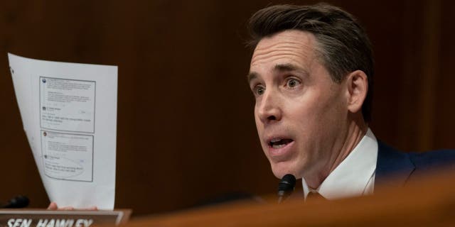 Sen. Josh Hawley, R-Mo., questions Colleen Shogan, nominee to be archivist of the U.S. National Archives and Records Administration about her social media postings, during the Senate Homeland Security and Governmental Affairs Committee full committee hearing on Shogan's nomination on Capitol Hill in Washington, Tuesday, Feb. 28, 2023.