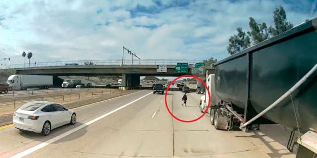 An unidentified man was reportedly unharmed after crossing a busy Arizona interstate.