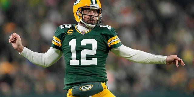 Aaron Rodgers, #12 of the Green Bay Packers, reacts after a play against the Los Angeles Rams in the second half at Lambeau Field on Dec. 19, 2022 in Green Bay, Wisconsin.