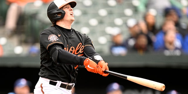 Adley Rutschman #35 of the Baltimore Orioles bats against the Toronto Blue Jays during game one of a doubleheader at Oriole Park at Camden Yards on October 05, 2022 in Baltimore, Maryland.