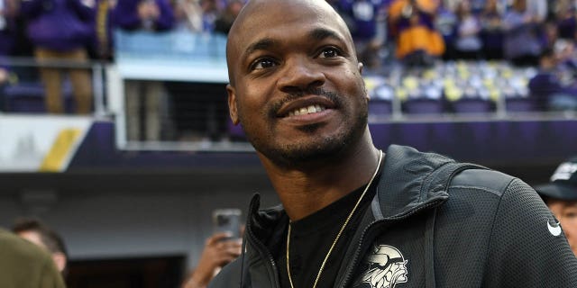 Adrian Peterson is seen on the field before the NFC wildcard playoff game between the New York Giants and the Minnesota Vikings at US Bank Stadium on January 15, 2023 in Minneapolis, Minnesota.