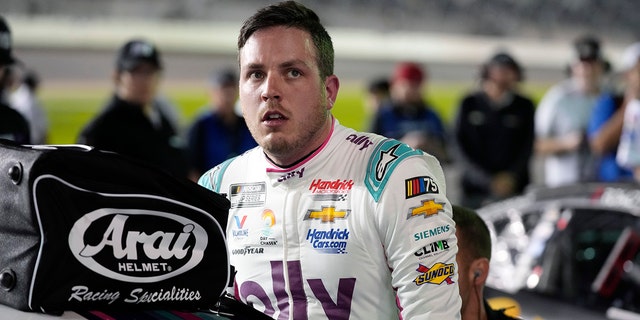 Alex Bowman gets out of his car after qualifying for the NASCAR Daytona 500 car race at Daytona International Speedway, Wednesday, February 15, 2023, in Daytona Beach, Florida.