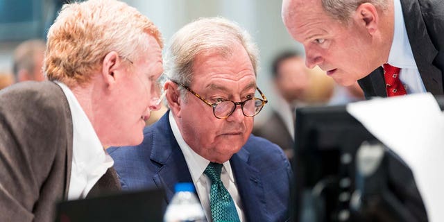 Alex Murdaugh, left, speaks with defense attorneys Dick Harpootlian, center, and Jim Griffin during Murdaugh’s double murder trial at the Colleton County Courthouse in Walterboro, S.C., Monday, Feb. 6, 2023. 
