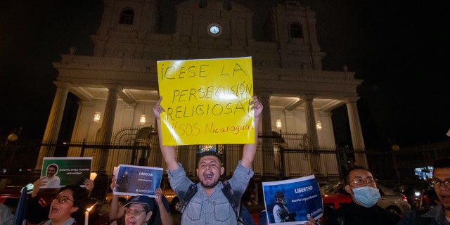 Nicaraguan citizens hold a demonstration in front of San Jose's Cathedral in Costa Rica to protest against the Nicaraguan government and the detention of Nicaraguan bishop and regime critic Rolando Alvarez, in San Jose, on Aug. 19, 2022.