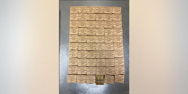 Boxes containing 1,200 .308-caliber rifle rounds seized by CBP officers at Hidalgo International Bridge during an outbound examination.