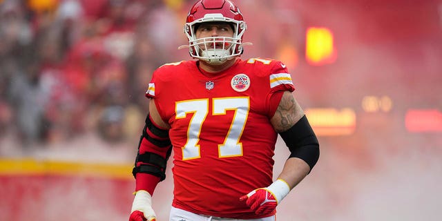 Andrew Wylie of the Kansas City Chiefs runs onto the field during introductions against the Jacksonville Jaguars at GEHA Field at Arrowhead Stadium on January 21, 2023 in Kansas City, Missouri.