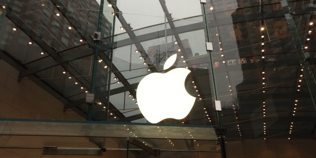 An Apple logo hangs inside their retail store on Broadway on Jan. 10, 2023, in New York City. 