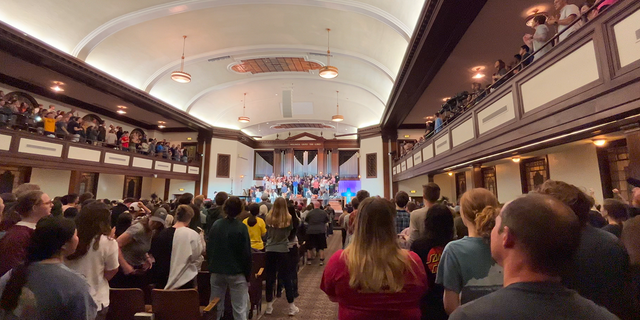 Students and young adults sing and pray at Asbury University on the Collegiate Day of Prayer.