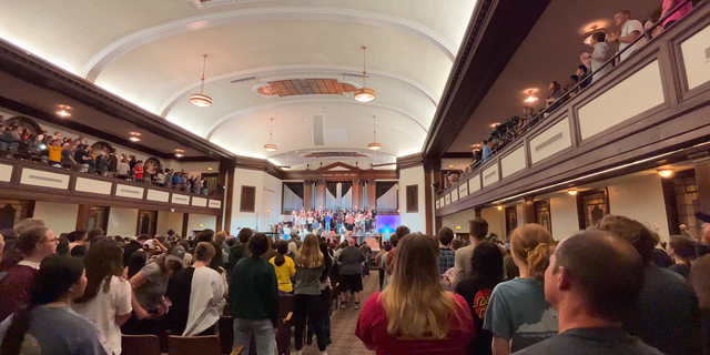 Students and young adults sing and pray at Asbury University on the Collegiate Day of Prayer.