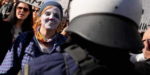 Art students gather during a protest outside parliament in Athens, Greece, on Feb. 2, 2023. Students are striking for a second day, closing theaters and halting television shoots to protest changes in the qualification system of civil service jobs. 