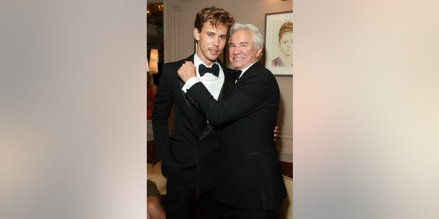 Austin Butler and "Elvis" director Baz Luhrmann celebrate Austin's BAFTAs win.