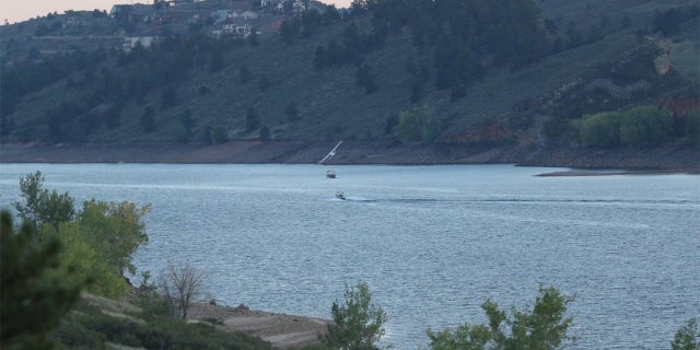 An airplane approaches a second boat in left turn on Horsetooth Reservoir in Colorado on Sept. 11, 2022. (Source: a witness)