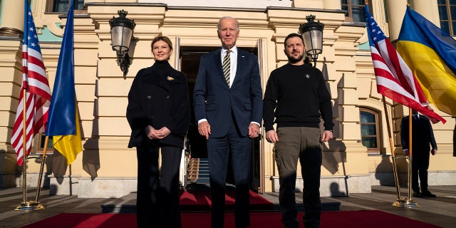 President Joe Biden, center, poses with Ukrainian President Volodymyr Zelenskyy, right, and Olena Zelenska, left, spouse of President Zelenskyy, at Mariinsky Palace during an unannounced visit in Kyiv, Ukraine, Monday, Feb. 20, 2023.