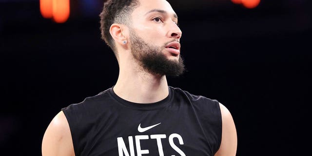 Brooklyn Nets guard Ben Simmons looks on before an NBA basketball game against the New York Knicks, Monday, Feb.13, 2023, in New York.