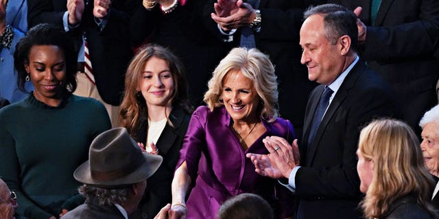 First Lady Jill Biden and Second Gentleman Douglas Emhoff spotted at President Biden's second State of the Union. The pair shared a kiss ahead of the President's address to Congress. 