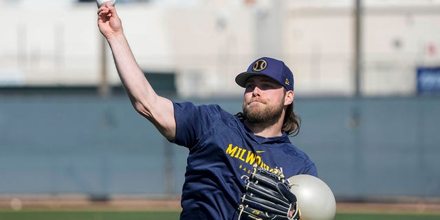 Corbin Burnes of the Milwaukee Brewers throws during spring training on Thursday, February 16, 2023, in Phoenix, Arizona.
