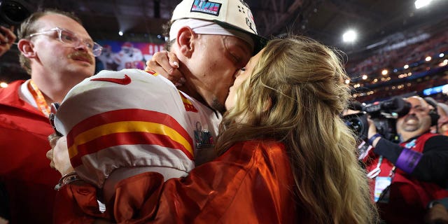 Patrick Mahomes celebrates with his wife Brittany Mahomes after the Kansas City Chiefs beat the Philadelphia Eagles in Super Bowl LVII on February 12, 2023.