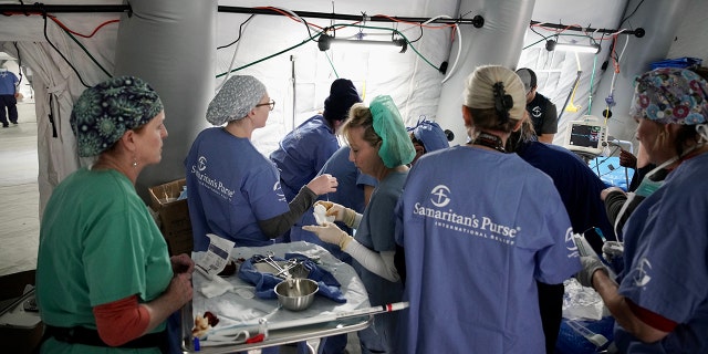 Samaritan's Purse nurses gather to assist patients injured in the earthquakes.
