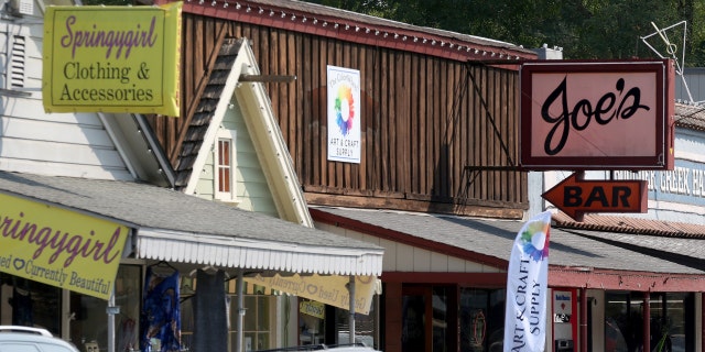 Joe's Bar and other businesses are seen along Highway 9 in downtown Boulder Creek, Calif., on Thursday, Oct. 8, 2020.