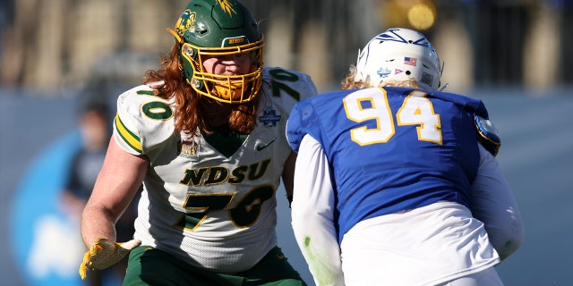 North Dakota State's Cody Mauch blocks against South Dakota State at Toyota Stadium on January 8, 2023, in Frisco, Texas.