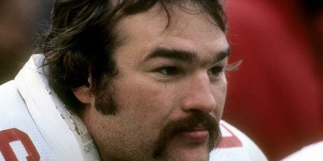 Conrad Dobler #66 of the St. Louis Cardinals watches the action from the sidelines during an NFL football game circa 1977. Dobler played for the Cardinals from 1972 to 1977.