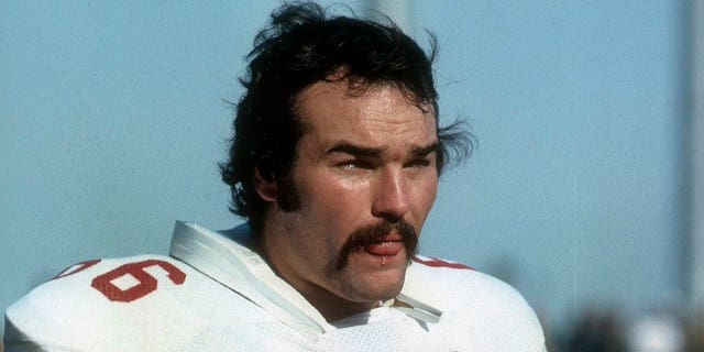 Conrad Dobler #66 of the St. Louis Cardinals watches the action from the sidelines during an NFL football game circa 1977. Dobler played for the Cardinals from 1972-77.