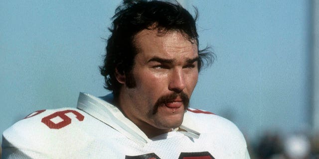 Conrad Dobler #66 of the St. Louis Cardinals watches the action from the sidelines during an NFL football game circa 1977. Dobler played for the Cardinals from 1972-77.