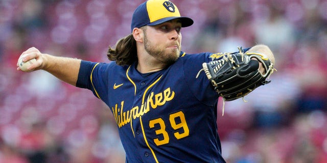 Milwaukee Brewers starting pitcher Corbin Burnes throws against the Reds on Sept. 24, 2022, in Cincinnati.