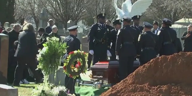 The man hailed a hero for stepping in to save a DC Metro customer during a shooting rampage earlier this month was laid to rest on Valentine's Day.