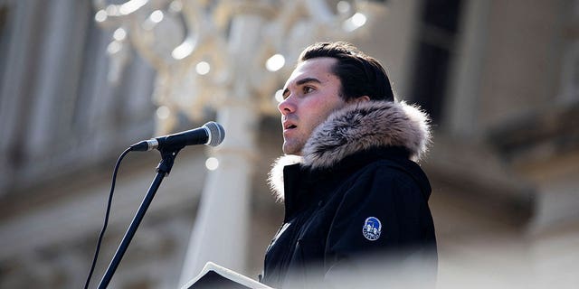 Parkland school shooting survivor David Hogg speaks to Michigan State University students as they gather to protest gun violence a week after a mass shooting at the State Capitol in Lansing, Michigan, U.S., February 20, 2023. 