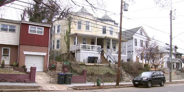 The Washington D.C. home where authorities discovered a decapitated body last week. A resident of the home has been charged with the killing. 