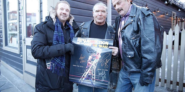 From left to right, Diamond Dallas Page, Scott Hall and Jake "The Snake" Roberts pose on Main Street during the 2015 Sundance Film Festival on Jan. 22, 2015 in Park City, Utah.