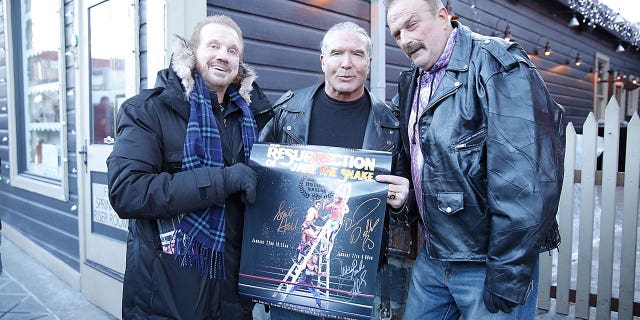 From left to right, Diamond Dallas Page, Scott Hall and Jake "The Snake" Roberts pose on Main Street during the 2015 Sundance Film Festival on Jan. 22, 2015 in Park City, Utah.