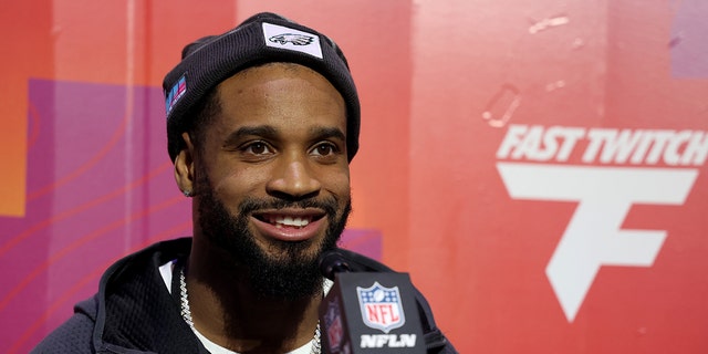 Darius Slay of the Philadelphia Eagles speaks to the media during opening night of Super Bowl LVII at the Footprint Center on February 6, 2023 in Phoenix, Arizona.
