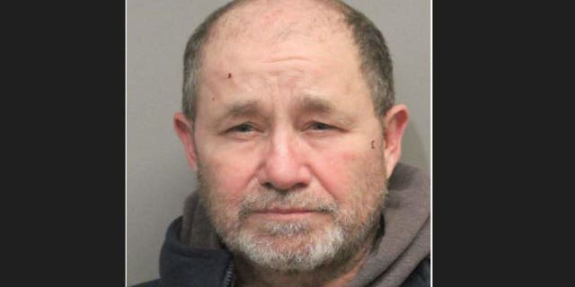 Russell Day, 56, was charged with aggravated assault with a deadly weapon