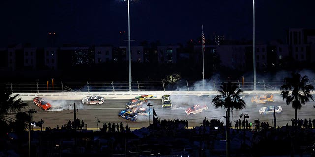 More than a dozen drivers are caught in a late-race crash during the NASCAR Cup Series 65th annual Daytona 500 at Daytona International Speedway on February 19, 2023 in Daytona Beach, Florida.