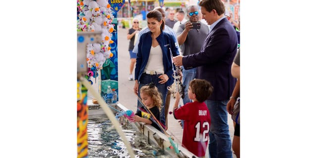 Republican Florida Gov. Ron DeSantis and wife, Casey, son, Mason, and daughter, Mamie, at the Florida state fair in Tampa on February 9, 2023.